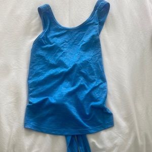 blue tank top that crosses and ties in the back size small